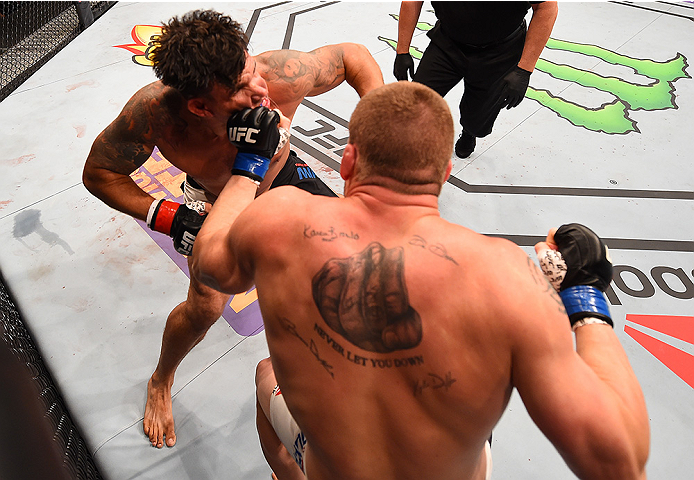 SAN DIEGO, CA - JULY 15:   (R-L) Todd Duffee punches Frank Mir in their heavyweight bout during the UFC event at the Valley View Casino Center on July 15, 2015 in San Diego, California. (Photo by Jeff Bottari/Zuffa LLC/Zuffa LLC via Getty Images)