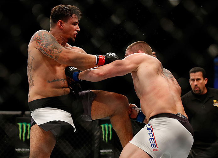 SAN DIEGO, CA - JULY 15:   (R-L) Frank Mir kneesTodd Duffee in their heavyweight bout during the UFC event at the Valley View Casino Center on July 15, 2015 in San Diego, California. (Photo by Todd Warshaw/Zuffa LLC/Zuffa LLC via Getty Images)