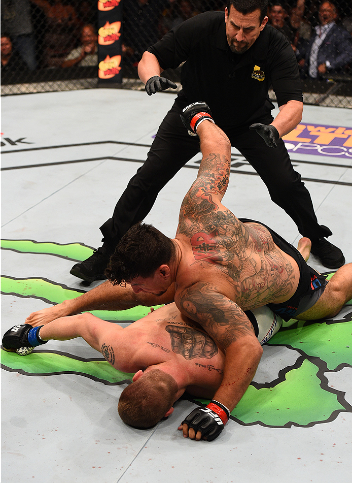 SAN DIEGO, CA - JULY 15:   Frank Mir (top) punches and knocks out Todd Duffee in their heavyweight bout during the UFC event at the Valley View Casino Center on July 15, 2015 in San Diego, California. (Photo by Jeff Bottari/Zuffa LLC/Zuffa LLC via Getty I