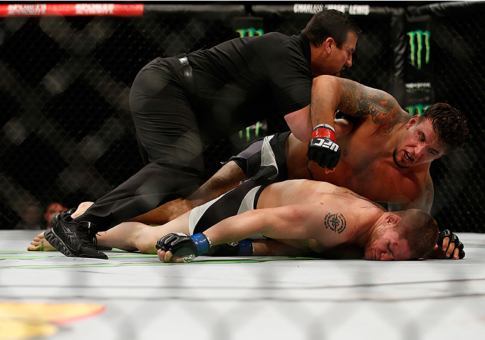 SAN DIEGO, CA - JULY 15: (L-R) Frank Mir punches and knocks out Todd Duffee in their heavyweight bout during the UFC event at the Valley View Casino Center on July 15, 2015 in San Diego, California. (Photo by Todd Warshaw/Zuffa LLC/Zuffa LLC via Getty I