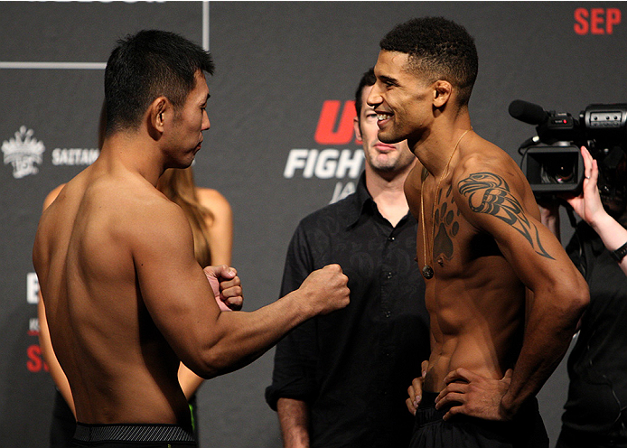 SAITAMA, JAPAN - SEPTEMBER 25: (L and R) Naoyuki Kotani and Kajan Johnson during the UFC weigh-in at the Saitama Super Arena on September 25, 2015 in Saitama, Japan. (Photo by Mitch Viquez/Zuffa LLC/Zuffa LLC via Getty Images)