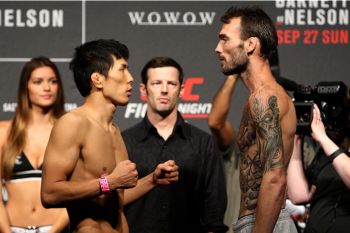 SAITAMA, JAPAN - SEPTEMBER 25: (L and R) Takeya Mizugaki and George Roop during the UFC weigh-in at the Saitama Super Arena on September 25, 2015 in Saitama, Japan. (Photo by Mitch Viquez/Zuffa LLC/Zuffa LLC via Getty Images)