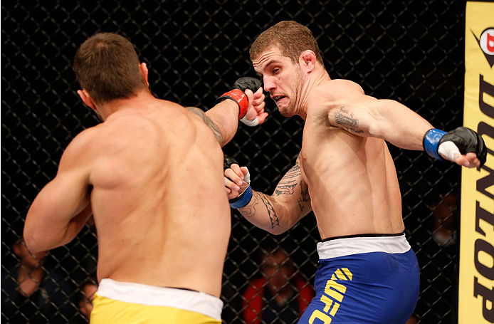 SAO PAULO, BRAZIL - MAY 31: (L-R) Ricardo Abreu and Wagner Silva trade punches in their middleweight fight during the UFC Fight Night event at the Ginasio do Ibirapuera on May 31, 2014 in Sao Paulo, Brazil. (Photo by Josh Hedges/Zuffa LLC/Zuffa LLC via Ge