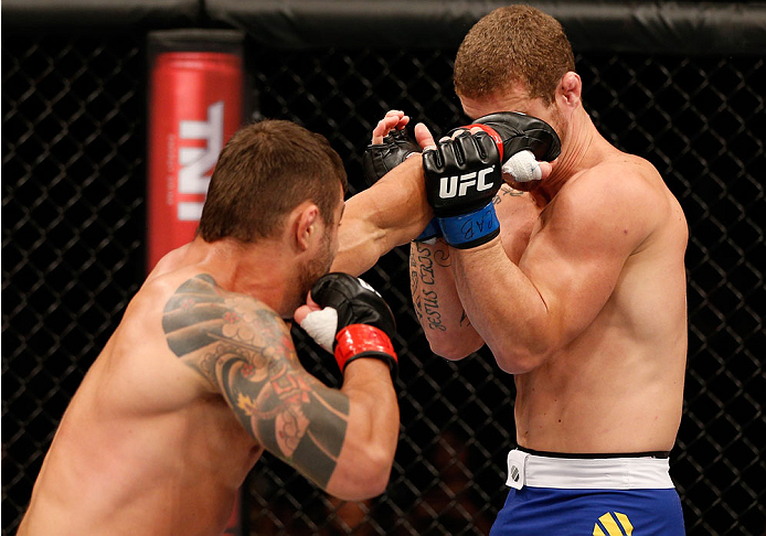 SAO PAULO, BRAZIL - MAY 31: (L-R) Ricardo Abreu punches Wagner Silva in their middleweight fight during the UFC Fight Night event at the Ginasio do Ibirapuera on May 31, 2014 in Sao Paulo, Brazil. (Photo by Josh Hedges/Zuffa LLC/Zuffa LLC via Getty Images