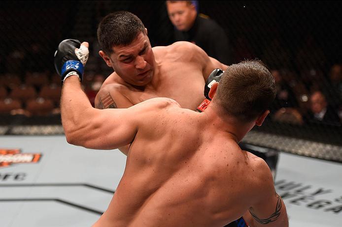 LAS VEGAS, NV - MAY 29: Chris De La Rocha (rear) punches Adam Milstead in their heavyweight bout during the UFC Fight Night event inside the Mandalay Bay Events Center on May 29, 2016 in Las Vegas, Nevada.  (Photo by Josh Hedges/Zuffa LLC/Zuffa LLC via Ge