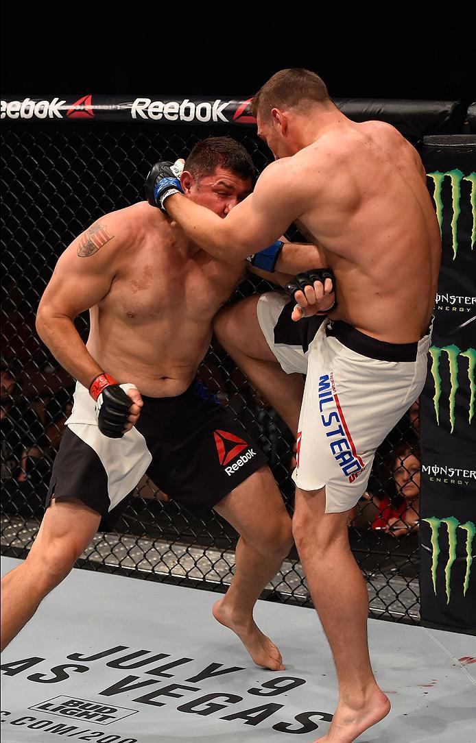 LAS VEGAS, NV - MAY 29: (R-L) Adam Milstead knees Chris De La Rocha in their heavyweight bout during the UFC Fight Night event inside the Mandalay Bay Events Center on May 29, 2016 in Las Vegas, Nevada. (Photo by Josh Hedges/Zuffa LLC/Zuffa LLC via Getty