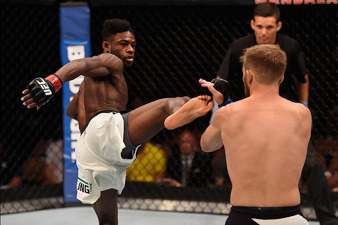 LAS VEGAS, NV - MAY 29: (L-R) Aljamain Sterling kicks Bryan Caraway in their bantamweight bout during the UFC Fight Night event inside the Mandalay Bay Events Center on May 29, 2016 in Las Vegas, Nevada.  (Photo by Josh Hedges/Zuffa LLC/Zuffa LLC via Gett