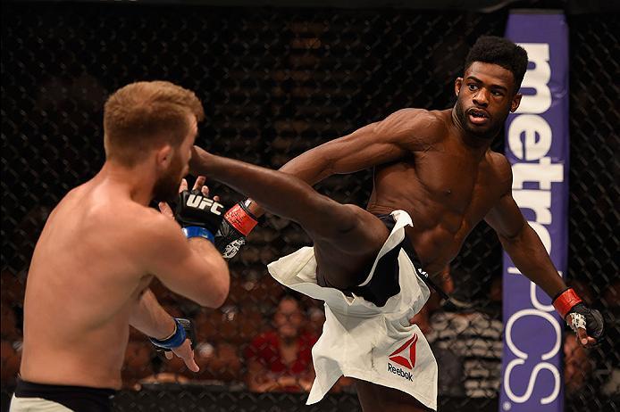 LAS VEGAS, NV - MAY 29: (R-L) Aljamain Sterling kicks Bryan Caraway in their bantamweight bout during the UFC Fight Night event inside the Mandalay Bay Events Center on May 29, 2016 in Las Vegas, Nevada. (Photo by Josh Hedges/Zuffa LLC/Zuffa LLC via Gett