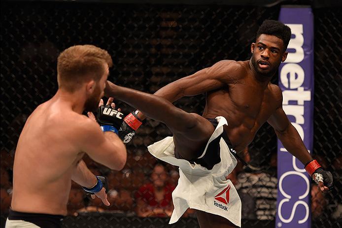 LAS VEGAS, NV - MAY 29: (R-L) Aljamain Sterling kicks Bryan Caraway in their bantamweight bout during the UFC Fight Night event inside the Mandalay Bay Events Center on May 29, 2016 in Las Vegas, Nevada.  (Photo by Josh Hedges/Zuffa LLC/Zuffa LLC via Gett