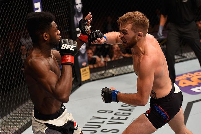 LAS VEGAS, NV - MAY 29: (R-L) Bryan Caraway punches Aljamain Sterling in their bantamweight bout during the UFC Fight Night event inside the Mandalay Bay Events Center on May 29, 2016 in Las Vegas, Nevada.  (Photo by Josh Hedges/Zuffa LLC/Zuffa LLC via Ge