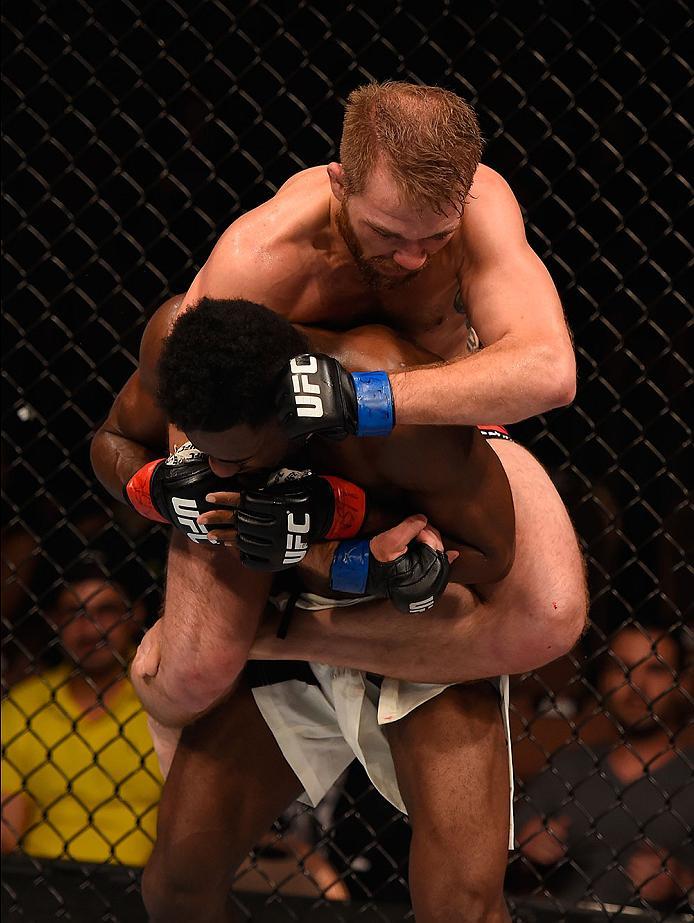 LAS VEGAS, NV - MAY 29: Bryan Caraway (top) punches Aljamain Sterling in their bantamweight bout during the UFC Fight Night event inside the Mandalay Bay Events Center on May 29, 2016 in Las Vegas, Nevada.  (Photo by Josh Hedges/Zuffa LLC/Zuffa LLC via Ge