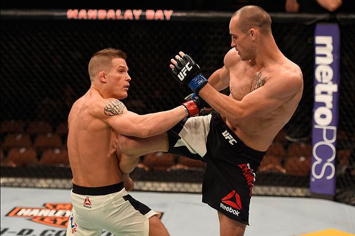LAS VEGAS, NV - MAY 29: (R-L) Shane Campbell of Canada kicks Erik Koch in their lightweight bout during the UFC Fight Night event inside the Mandalay Bay Events Center on May 29, 2016 in Las Vegas, Nevada. (Photo by Josh Hedges/Zuffa LLC/Zuffa LLC via Ge