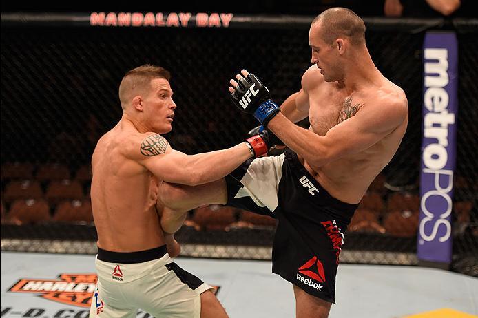 LAS VEGAS, NV - MAY 29: (R-L) Shane Campbell of Canada kicks Erik Koch in their lightweight bout during the UFC Fight Night event inside the Mandalay Bay Events Center on May 29, 2016 in Las Vegas, Nevada.  (Photo by Josh Hedges/Zuffa LLC/Zuffa LLC via Ge