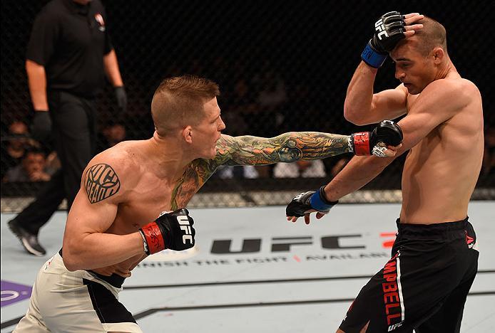 LAS VEGAS, NV - MAY 29: (L-R) Erik Koch punches Shane Campbell of Canada in their lightweight bout during the UFC Fight Night event inside the Mandalay Bay Events Center on May 29, 2016 in Las Vegas, Nevada. (Photo by Josh Hedges/Zuffa LLC/Zuffa LLC via