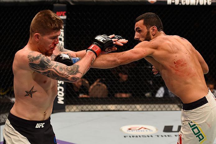 LAS VEGAS, NV - MAY 29: (R-L) Alberto Uda of Brazil punches Jake Collier in their middleweight bout during the UFC Fight Night event inside the Mandalay Bay Events Center on May 29, 2016 in Las Vegas, Nevada. (Photo by Josh Hedges/Zuffa LLC/Zuffa LLC via