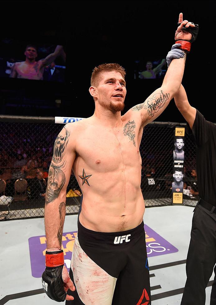 LAS VEGAS, NV - MAY 29: Jake Collier reacts to his victory over Alberto Uda of Brazil in their middleweight bout during the UFC Fight Night event inside the Mandalay Bay Events Center on May 29, 2016 in Las Vegas, Nevada.  (Photo by Josh Hedges/Zuffa LLC/