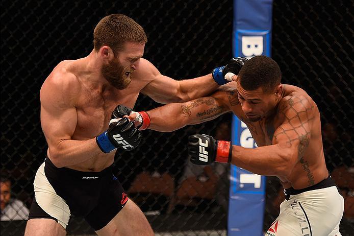 LAS VEGAS, NV - MAY 29: (L-R) Jordan Rinaldi punches Abel Trujillo in their lightweight bout during the UFC Fight Night event inside the Mandalay Bay Events Center on May 29, 2016 in Las Vegas, Nevada. (Photo by Josh Hedges/Zuffa LLC/Zuffa LLC via Getty