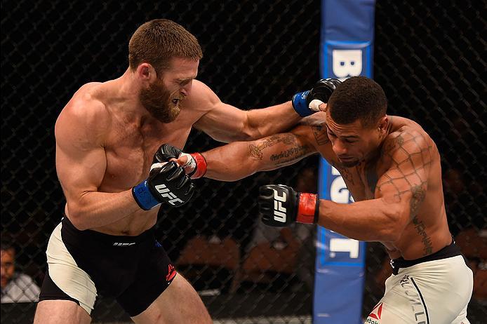 LAS VEGAS, NV - MAY 29:  (L-R) Jordan Rinaldi punches Abel Trujillo in their lightweight bout during the UFC Fight Night event inside the Mandalay Bay Events Center on May 29, 2016 in Las Vegas, Nevada.  (Photo by Josh Hedges/Zuffa LLC/Zuffa LLC via Getty