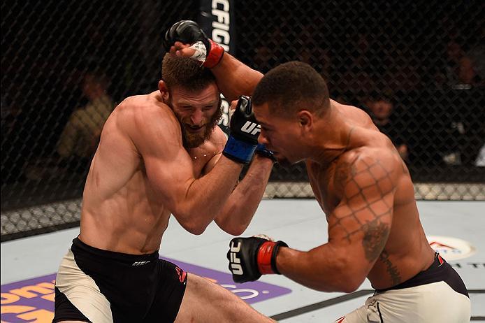 LAS VEGAS, NV - MAY 29: (R-L) Abel Trujillo punches Jordan Rinaldi in their lightweight bout during the UFC Fight Night event inside the Mandalay Bay Events Center on May 29, 2016 in Las Vegas, Nevada. (Photo by Josh Hedges/Zuffa LLC/Zuffa LLC via Getty