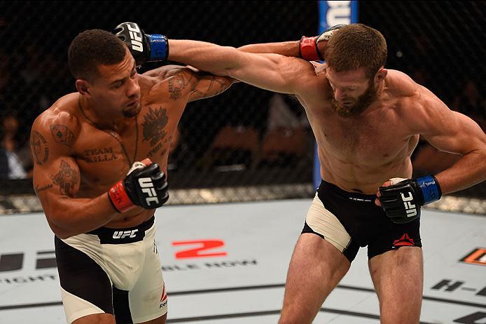 LAS VEGAS, NV - MAY 29: (L-R) Abel Trujillo punches Jordan Rinaldi in their lightweight bout during the UFC Fight Night event inside the Mandalay Bay Events Center on May 29, 2016 in Las Vegas, Nevada.  (Photo by Josh Hedges/Zuffa LLC/Zuffa LLC via Getty 