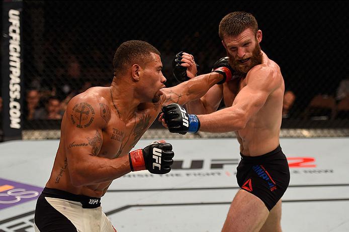 LAS VEGAS, NV - MAY 29: (L-R) Abel Trujillo punches Jordan Rinaldi in their lightweight bout during the UFC Fight Night event inside the Mandalay Bay Events Center on May 29, 2016 in Las Vegas, Nevada. (Photo by Josh Hedges/Zuffa LLC/Zuffa LLC via Getty