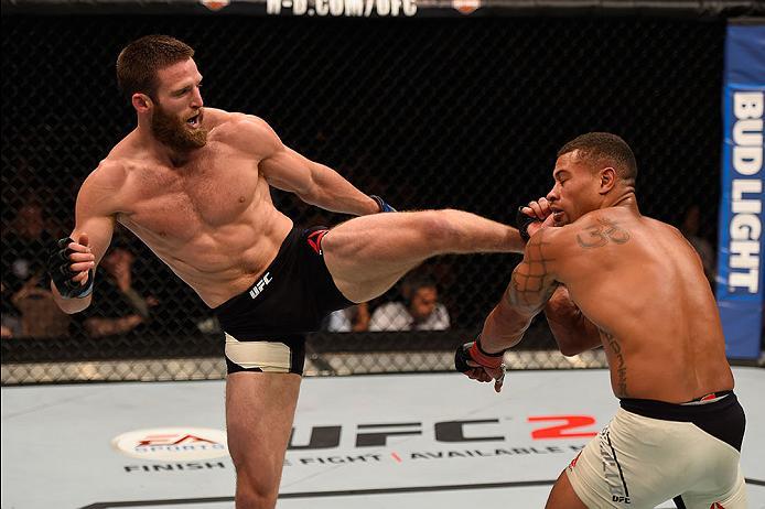 LAS VEGAS, NV - MAY 29:  (L-R) Jordan Rinaldi kicks Abel Trujillo in their lightweight bout during the UFC Fight Night event inside the Mandalay Bay Events Center on May 29, 2016 in Las Vegas, Nevada.  (Photo by Josh Hedges/Zuffa LLC/Zuffa LLC via Getty I