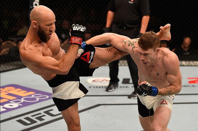 LAS VEGAS, NV - MAY 29: (L-R) Joshua Burkman kicks Paul Felder in their lightweight bout during the UFC Fight Night event inside the Mandalay Bay Events Center on May 29, 2016 in Las Vegas, Nevada. (Photo by Josh Hedges/Zuffa LLC/Zuffa LLC via Getty Imag