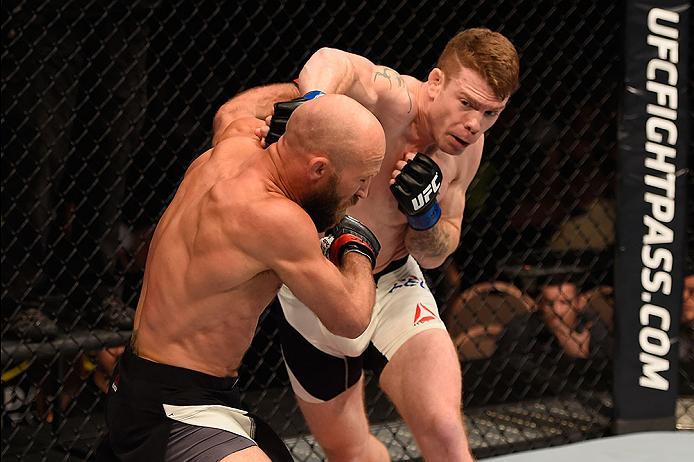 LAS VEGAS, NV - MAY 29: (R-L) Paul Felder punches Joshua Burkman in their lightweight bout during the UFC Fight Night event inside the Mandalay Bay Events Center on May 29, 2016 in Las Vegas, Nevada.  (Photo by Josh Hedges/Zuffa LLC/Zuffa LLC via Getty Im