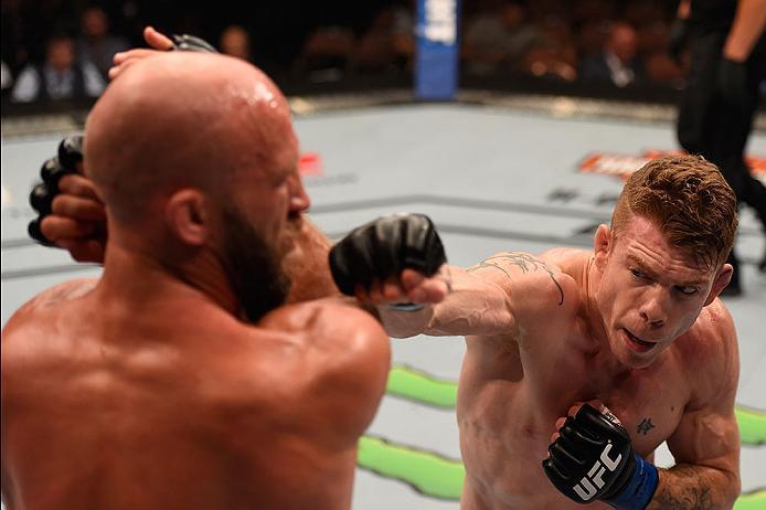 LAS VEGAS, NV - MAY 29: (R-L) Paul Felder punches Joshua Burkman in their lightweight bout during the UFC Fight Night event inside the Mandalay Bay Events Center on May 29, 2016 in Las Vegas, Nevada.  (Photo by Josh Hedges/Zuffa LLC/Zuffa LLC via Getty Im