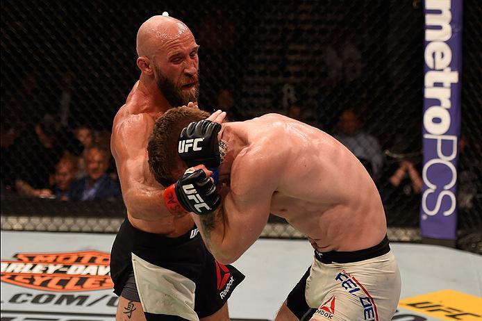LAS VEGAS, NV - MAY 29: (L-R) Joshua Burkman punches Paul Felder in their lightweight bout during the UFC Fight Night event inside the Mandalay Bay Events Center on May 29, 2016 in Las Vegas, Nevada. (Photo by Josh Hedges/Zuffa LLC/Zuffa LLC via Getty Im
