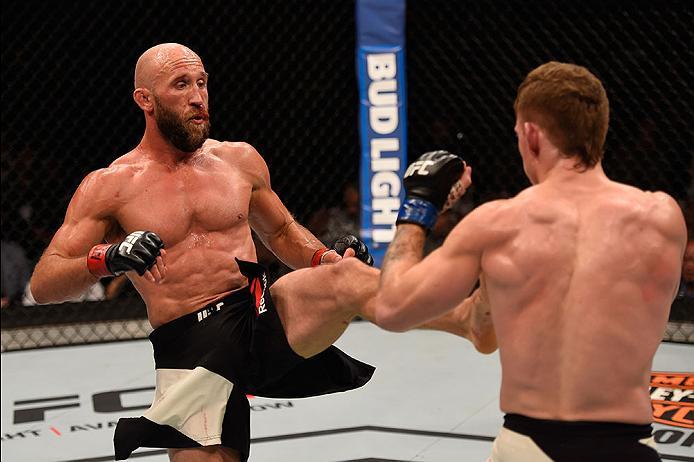 LAS VEGAS, NV - MAY 29: (L-R) Joshua Burkman kicks Paul Felder in their lightweight bout during the UFC Fight Night event inside the Mandalay Bay Events Center on May 29, 2016 in Las Vegas, Nevada. (Photo by Josh Hedges/Zuffa LLC/Zuffa LLC via Getty Imag