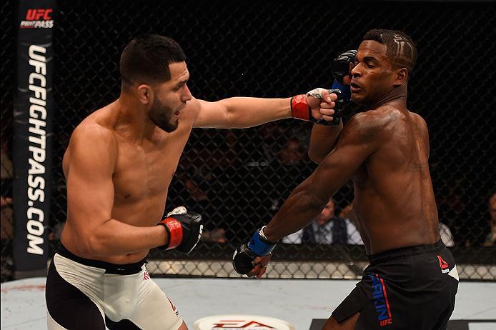 LAS VEGAS, NV - MAY 29: (L-R) Jorge Masvidal punches Lorenz Larkin in their welterweight bout during the UFC Fight Night event inside the Mandalay Bay Events Center on May 29, 2016 in Las Vegas, Nevada.  (Photo by Josh Hedges/Zuffa LLC/Zuffa LLC via Getty