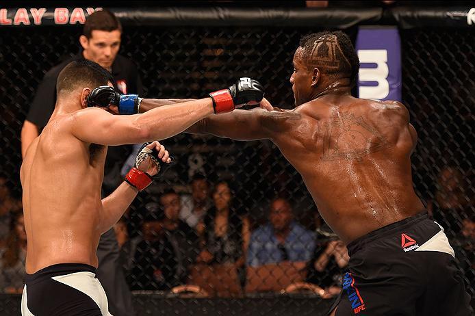 LAS VEGAS, NV - MAY 29: (R-L) Lorenz Larkin punches Jorge Masvidal in their welterweight bout during the UFC Fight Night event inside the Mandalay Bay Events Center on May 29, 2016 in Las Vegas, Nevada.  (Photo by Josh Hedges/Zuffa LLC/Zuffa LLC via Getty