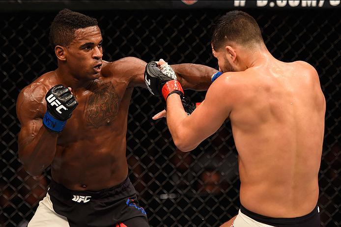 LAS VEGAS, NV - MAY 29: (L-R) Lorenz Larkin punches Jorge Masvidal in their welterweight bout during the UFC Fight Night event inside the Mandalay Bay Events Center on May 29, 2016 in Las Vegas, Nevada.  (Photo by Josh Hedges/Zuffa LLC/Zuffa LLC via Getty