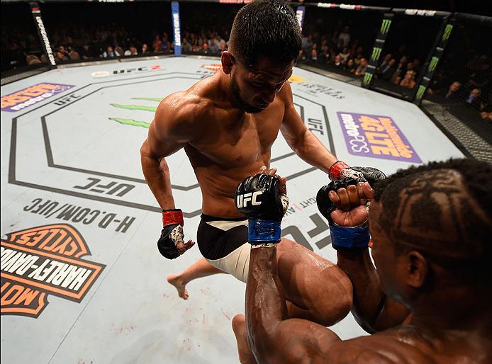 LAS VEGAS, NV - MAY 29: (L-R) Jorge Masvidal knees Lorenz Larkin in their welterweight bout during the UFC Fight Night event inside the Mandalay Bay Events Center on May 29, 2016 in Las Vegas, Nevada. (Photo by Josh Hedges/Zuffa LLC/Zuffa LLC via Getty I