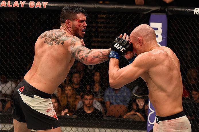 LAS VEGAS, NV - MAY 29: (L-R) Chris Camozzi punches Vitor Miranda of Brazil in their middleweight bout during the UFC Fight Night event inside the Mandalay Bay Events Center on May 29, 2016 in Las Vegas, Nevada. (Photo by Josh Hedges/Zuffa LLC/Zuffa LLC