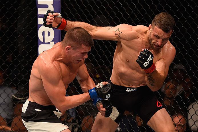 LAS VEGAS, NV - MAY 29: (R-L) Tarec Saffiedine of Belgium punches Rick Story in their welterweight bout during the UFC Fight Night event inside the Mandalay Bay Events Center on May 29, 2016 in Las Vegas, Nevada.  (Photo by Josh Hedges/Zuffa LLC/Zuffa LLC