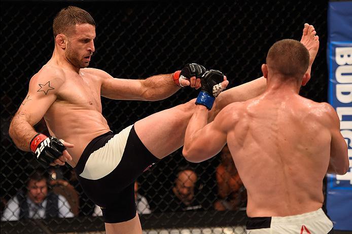 LAS VEGAS, NV - MAY 29: (L-R) Tarec Saffiedine of Belgium kicks Rick Story in their welterweight bout during the UFC Fight Night event inside the Mandalay Bay Events Center on May 29, 2016 in Las Vegas, Nevada. (Photo by Josh Hedges/Zuffa LLC/Zuffa LLC v