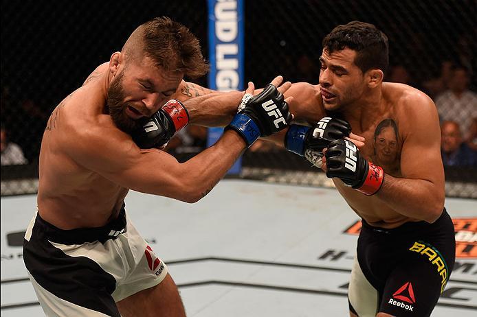 LAS VEGAS, NV - MAY 29: (R-L) Renan Barao of Brazil punches Jeremy Stephens in their featherweight bout during the UFC Fight Night event inside the Mandalay Bay Events Center on May 29, 2016 in Las Vegas, Nevada. (Photo by Josh Hedges/Zuffa LLC/Zuffa LLC