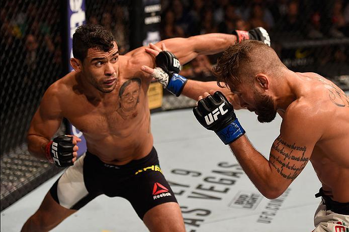 LAS VEGAS, NV - MAY 29: (L-R) Renan Barao of Brazil punches Jeremy Stephens in their featherweight bout during the UFC Fight Night event inside the Mandalay Bay Events Center on May 29, 2016 in Las Vegas, Nevada.  (Photo by Josh Hedges/Zuffa LLC/Zuffa LLC