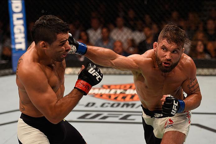 LAS VEGAS, NV - MAY 29: (R-L) Jeremy Stephens punches Renan Barao of Brazil in their featherweight bout during the UFC Fight Night event inside the Mandalay Bay Events Center on May 29, 2016 in Las Vegas, Nevada. (Photo by Josh Hedges/Zuffa LLC/Zuffa LLC
