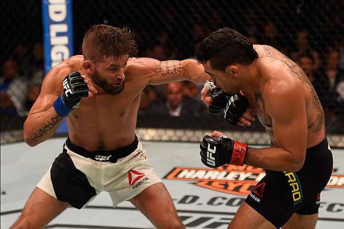 LAS VEGAS, NV - MAY 29: (L-R) Jeremy Stephens punches Renan Barao of Brazil in their featherweight bout during the UFC Fight Night event inside the Mandalay Bay Events Center on May 29, 2016 in Las Vegas, Nevada. (Photo by Josh Hedges/Zuffa LLC/Zuffa LLC