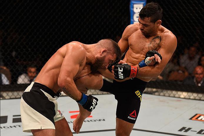 LAS VEGAS, NV - MAY 29: (R-L) Renan Barao of Brazil knees Jeremy Stephens in their featherweight bout during the UFC Fight Night event inside the Mandalay Bay Events Center on May 29, 2016 in Las Vegas, Nevada. (Photo by Josh Hedges/Zuffa LLC/Zuffa LLC v