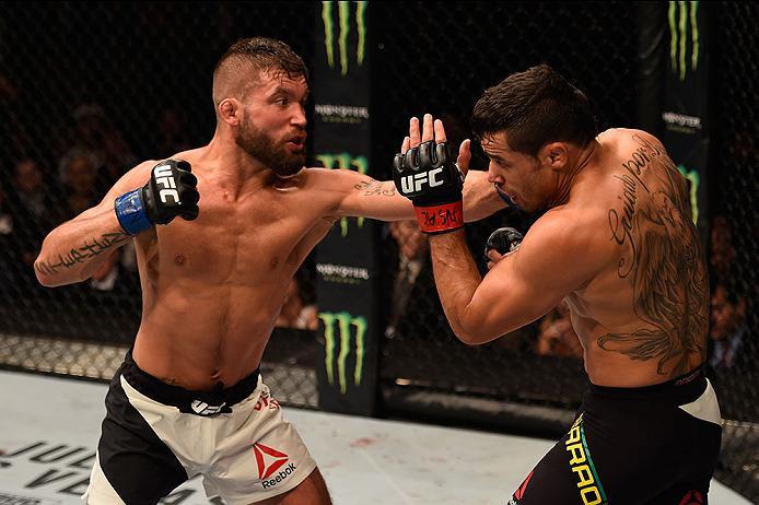 LAS VEGAS, NV - MAY 29: (L-R) Jeremy Stephens punches Renan Barao of Brazil in their featherweight bout during the UFC Fight Night event inside the Mandalay Bay Events Center on May 29, 2016 in Las Vegas, Nevada. (Photo by Josh Hedges/Zuffa LLC/Zuffa LLC