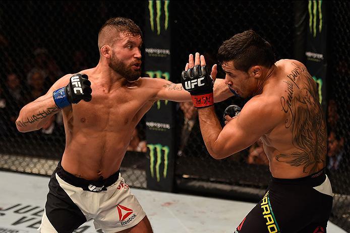 LAS VEGAS, NV - MAY 29: (L-R) Jeremy Stephens punches Renan Barao of Brazil in their featherweight bout during the UFC Fight Night event inside the Mandalay Bay Events Center on May 29, 2016 in Las Vegas, Nevada.  (Photo by Josh Hedges/Zuffa LLC/Zuffa LLC