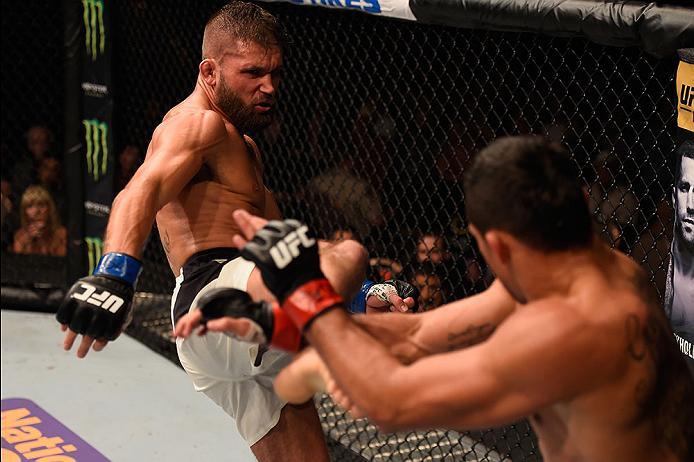 LAS VEGAS, NV - MAY 29: (L-R) Jeremy Stephens kicks Renan Barao of Brazil in their featherweight bout during the UFC Fight Night event inside the Mandalay Bay Events Center on May 29, 2016 in Las Vegas, Nevada. (Photo by Josh Hedges/Zuffa LLC/Zuffa LLC v