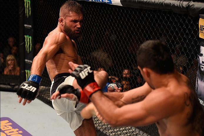 LAS VEGAS, NV - MAY 29: (L-R) Jeremy Stephens kicks Renan Barao of Brazil in their featherweight bout during the UFC Fight Night event inside the Mandalay Bay Events Center on May 29, 2016 in Las Vegas, Nevada.  (Photo by Josh Hedges/Zuffa LLC/Zuffa LLC v