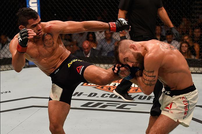 LAS VEGAS, NV - MAY 29: (L-R) Renan Barao of Brazil kicks Jeremy Stephens in their featherweight bout during the UFC Fight Night event inside the Mandalay Bay Events Center on May 29, 2016 in Las Vegas, Nevada. (Photo by Josh Hedges/Zuffa LLC/Zuffa LLC v
