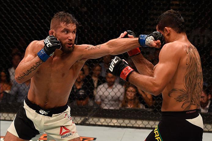 LAS VEGAS, NV - MAY 29: (L-R) Jeremy Stephens punches Renan Barao of Brazil in their featherweight bout during the UFC Fight Night event inside the Mandalay Bay Events Center on May 29, 2016 in Las Vegas, Nevada. (Photo by Josh Hedges/Zuffa LLC/Zuffa LLC