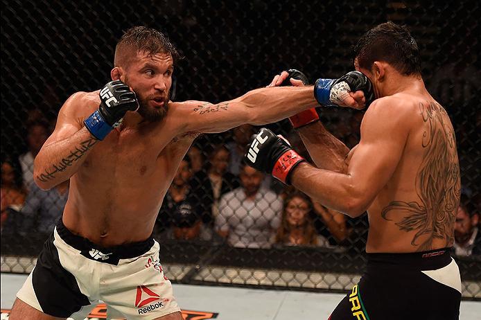 LAS VEGAS, NV - MAY 29: (L-R) Jeremy Stephens punches Renan Barao of Brazil in their featherweight bout during the UFC Fight Night event inside the Mandalay Bay Events Center on May 29, 2016 in Las Vegas, Nevada.  (Photo by Josh Hedges/Zuffa LLC/Zuffa LLC